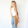 HOF Everyday Apron in navy denim worn by hair stylist in salon