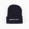 Black beanie with 'WASH DAY' text on a white background