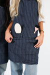 HOF Everyday Apron in navy denim shown with extra-long ties
