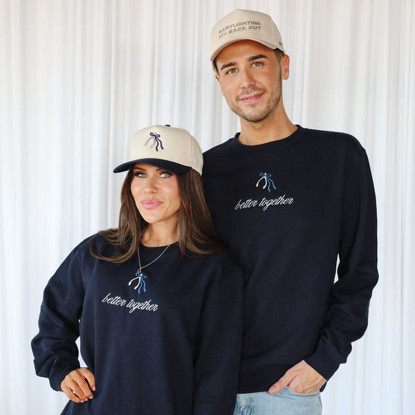 Navy Better Together Hoodie worn by hair stylist in salon