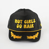 Black Hot Girls Do Hair trucker hat with yellow puff embroidery and gold rope detail