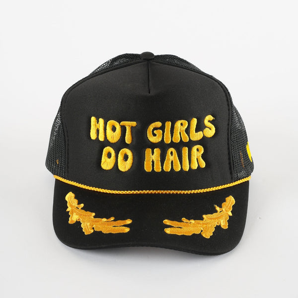 Black Hot Girls Do Hair trucker hat with yellow puff embroidery and gold rope detail