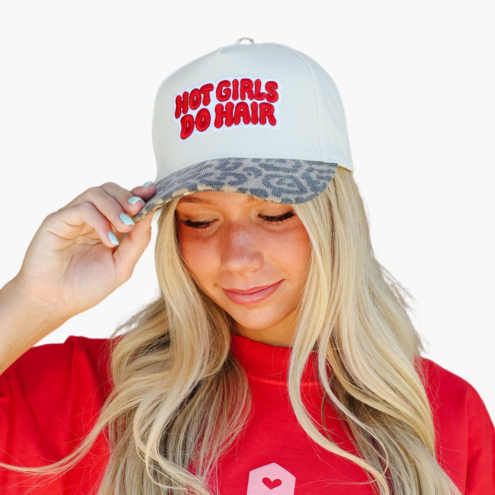 House of Foils cheetah Hot Girls Do Hair hat for hair stylists - front view