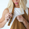 HOF Everyday Apron in brown shown with extra-long ties