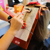 Hottie Balayage Board in use - stylist using HOF balayage board for highlights