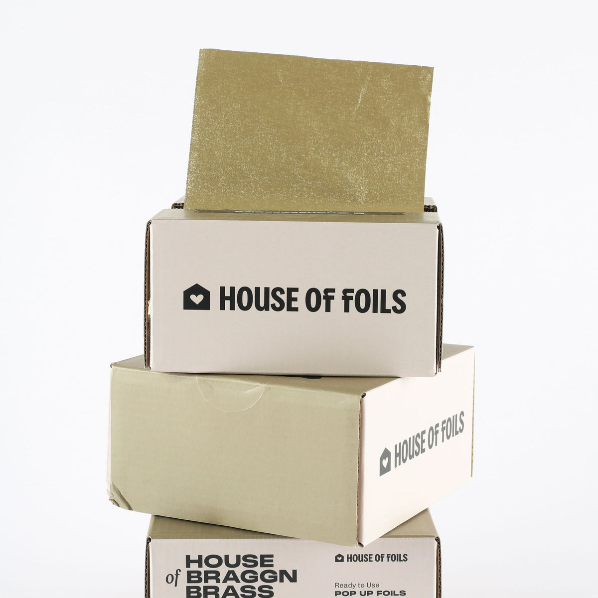 House of Braggn Brass foil sheets fanned out showing full print