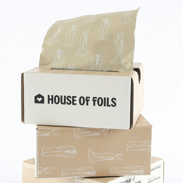 House of Jessi + Stew foil sheets fanned out showing full print