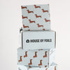 House of Mr Weenie foil sheets fanned out showing dachshund print